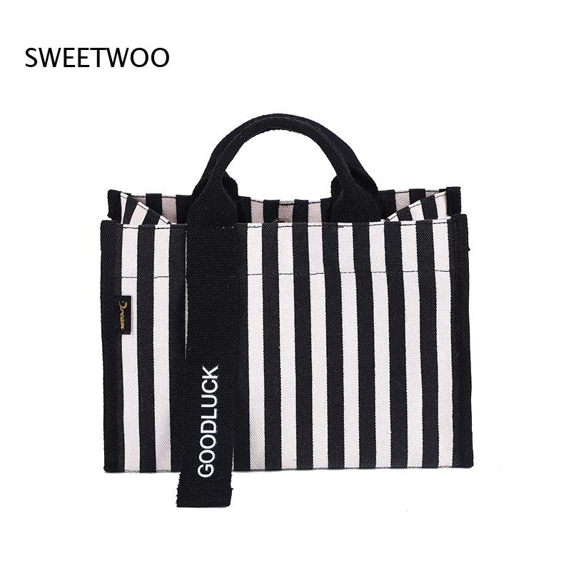 حقيبة يد صغيرة من القماش بخطوط - مراجعة Women Hand Bags For Office وسعره